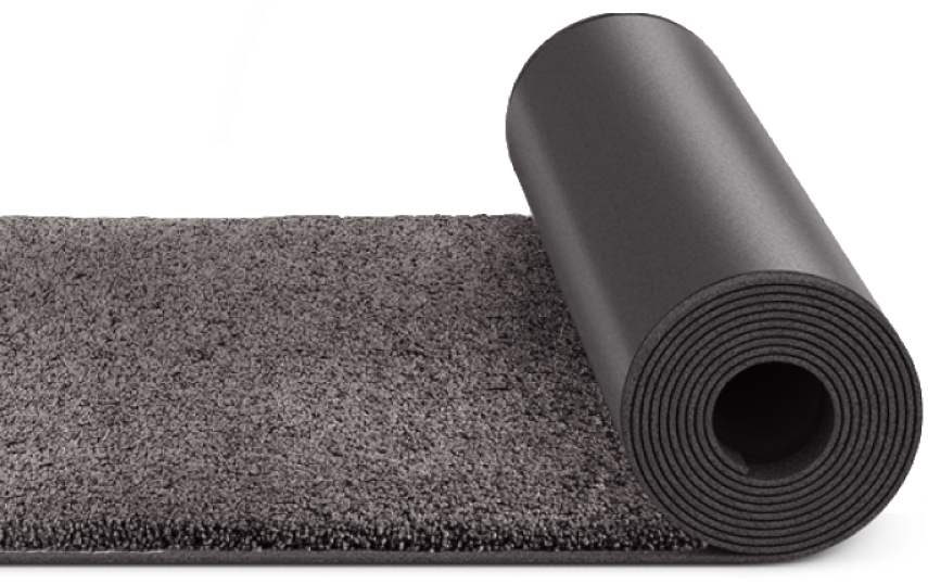 Karpett branded dirt-control mat at a commercial entrance